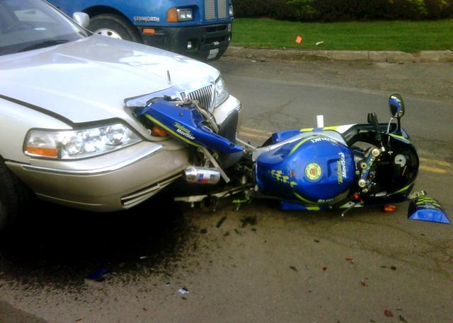 Motorcycle and car collision on Peck Lane near Grandview Court on 04.13.2010